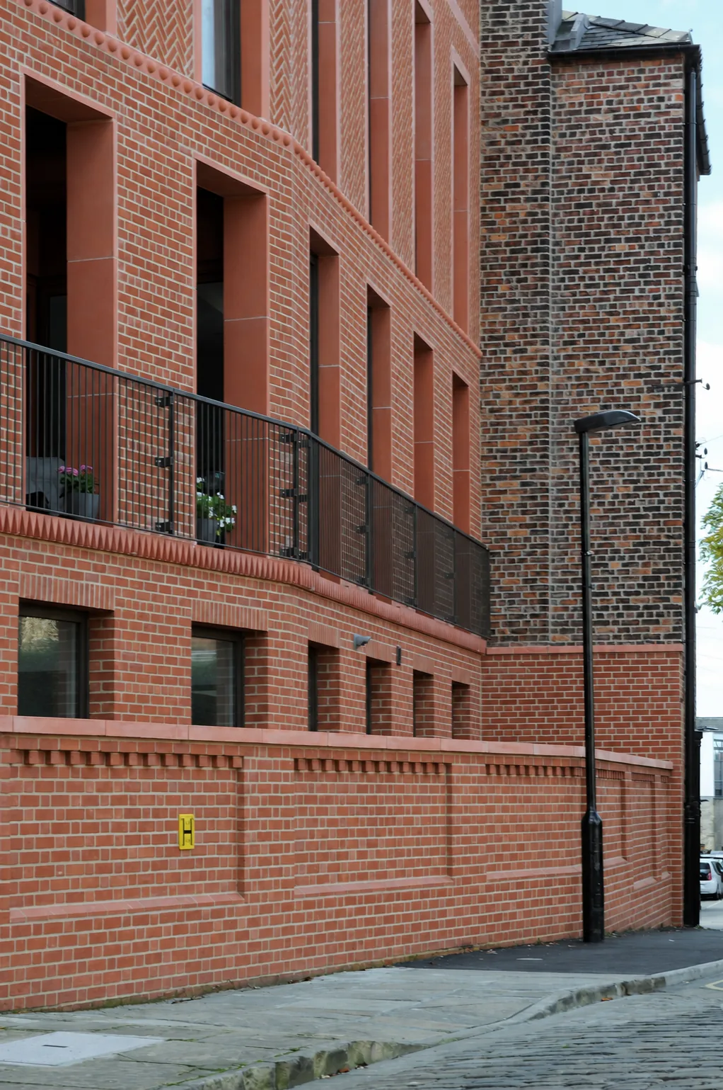 Bailgate Court — the new terrace meeting the old gable on the corner